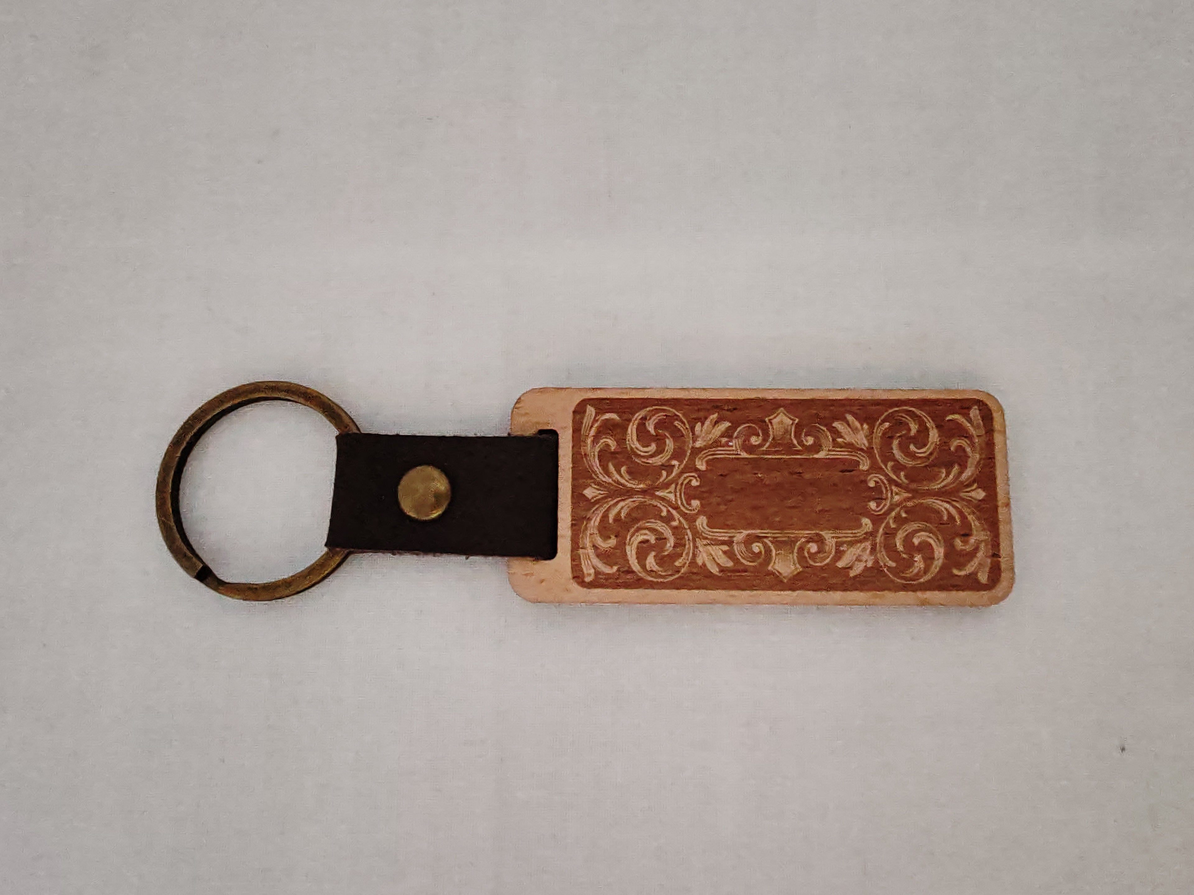 Porte clés gravé motif Calligraphie